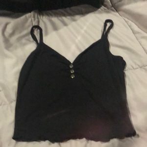 Cropped, black, spaghetti strap tank.